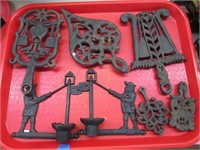 Cast Iron Trivets and Candle Holders.