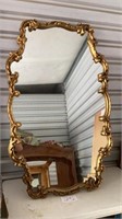 Hanging mirror measures approximately 35 inches