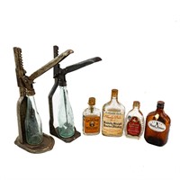 2 Cast Iron Bottle Capper's and 4 Whiskey Bottles