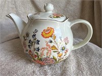 White Porcelain Teapot with Floral Design