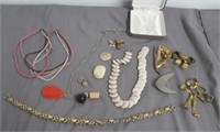 Costume jewelry, necklaces, brooches, etc.