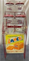 ORIG. 4 JAR LANCE RACK W/ JARS AND SIGN