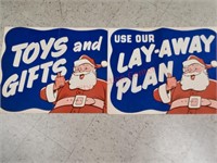 Store advertisement Santa toy and layaway signs