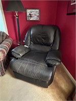 BLACK ROCKER RECLINER - SHOWS WEAR