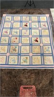 Antique hand sewn quilt with crazy stitching
