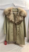 Vintage ladies leather coat with a fur collar