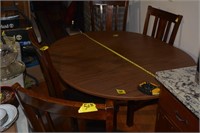 568:  Hardwood table 4 chairs 4.5 ft long