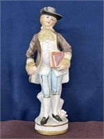 Vintage man porcelain figurine holding books