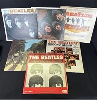 8 vintage Beatles vinyl LP records