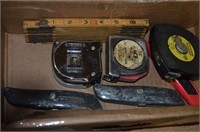 BOX LOT -- ASSORTED TAPE MEASURES, BOX CUTTERS