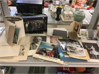 Vintage photographs and sopranos DVDs.