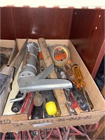 assorted tools including screwdrivers wrenches