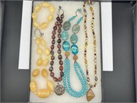 FOUR STERLING GEMSTONE NECKLACES AND ONE BRACELET