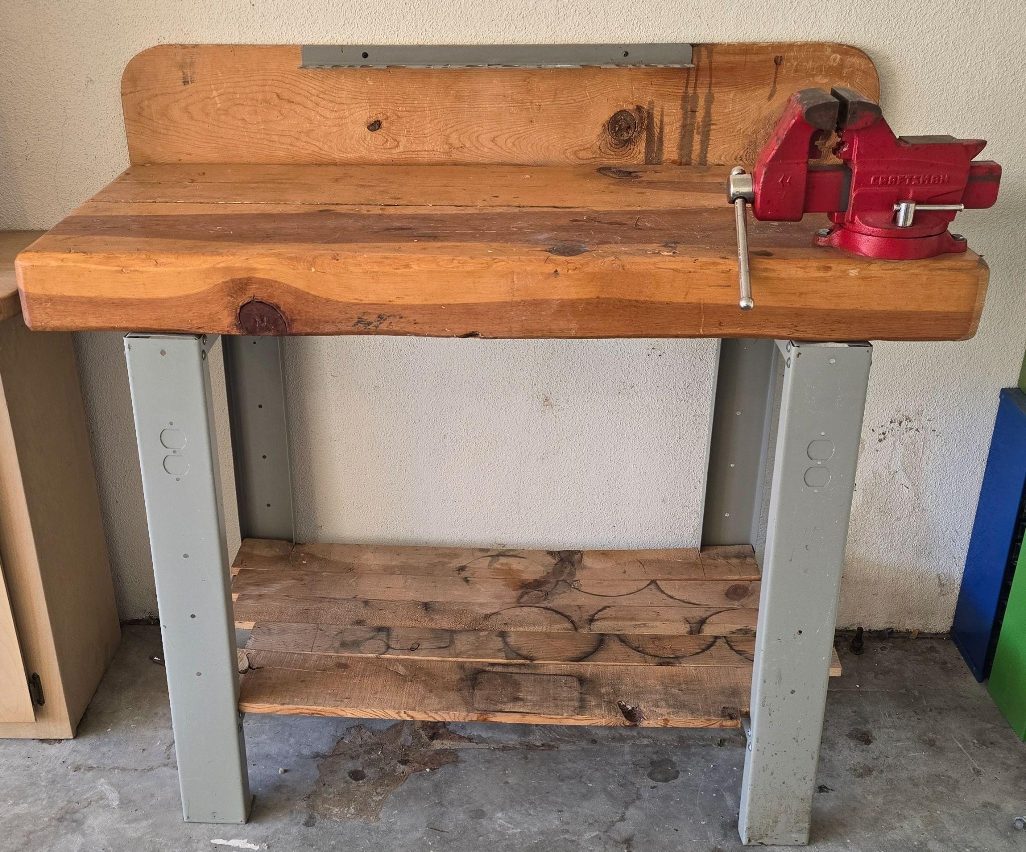 Wooden work bench with Craftsman vise