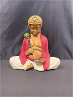Plaster cast Buddha with butterfly