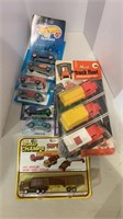 10 toy cars and trucks, including a pack of three