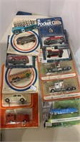 10 toy collector cars, in the blister packs, road