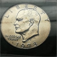 1973 S Eisenhower $1 BRILL UNCIRC B