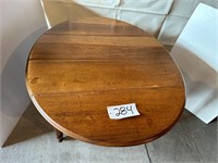 Oval 4-leg oak table on castors