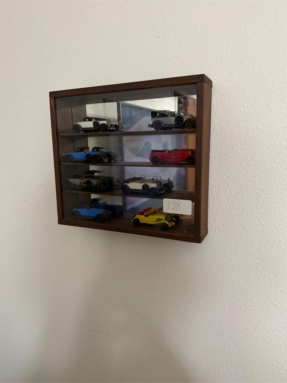 SHADOW BOX WITH 8 VINTAGE CARS