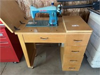 Sewing cabinet w/ built-in sewing machine