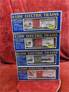 (4)K-Line Christmas Holiday box cars. New.