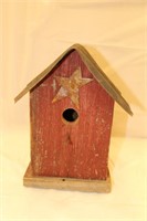 Rustic wooden birdhouse w/ tin roof