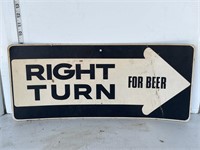 Cardboard sign- right turn for beer