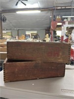 small wooden advertisement boxes