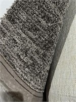 Roll of grey mingle carpet at least 800 sq ft