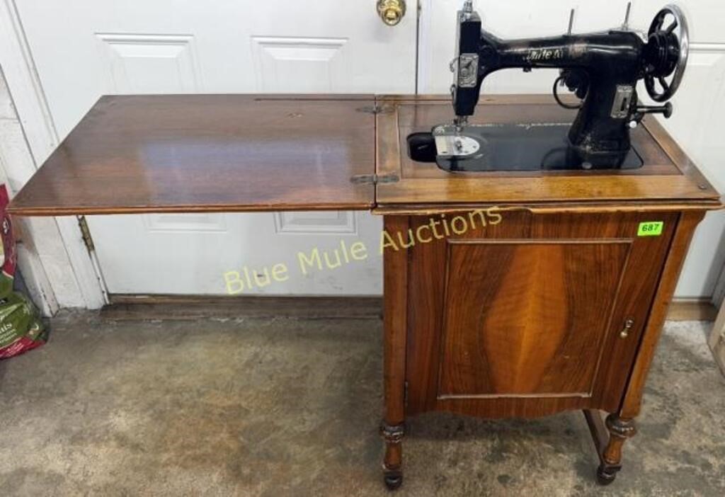 White Rotary treadle sewing machine in cabinet
