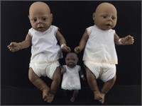 3 Collectible baby dolls.