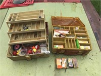 2 tackle boxes and tackle