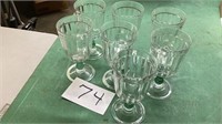 Seven pedestal goblets 7” tall, clear glass with