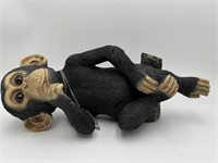LARGE RESIN LYING ON HIS SIDE MONKEY
