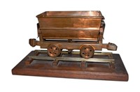 Functioning Scale Model of an Ore Cart in Copper