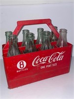 Vintage Coca-Cola bottle carrier & bottles