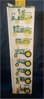 8 John Deere toy tractors