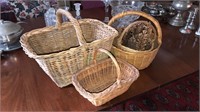 Group of four vintage baskets, The large one is