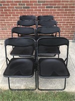 8 Black folding chairs