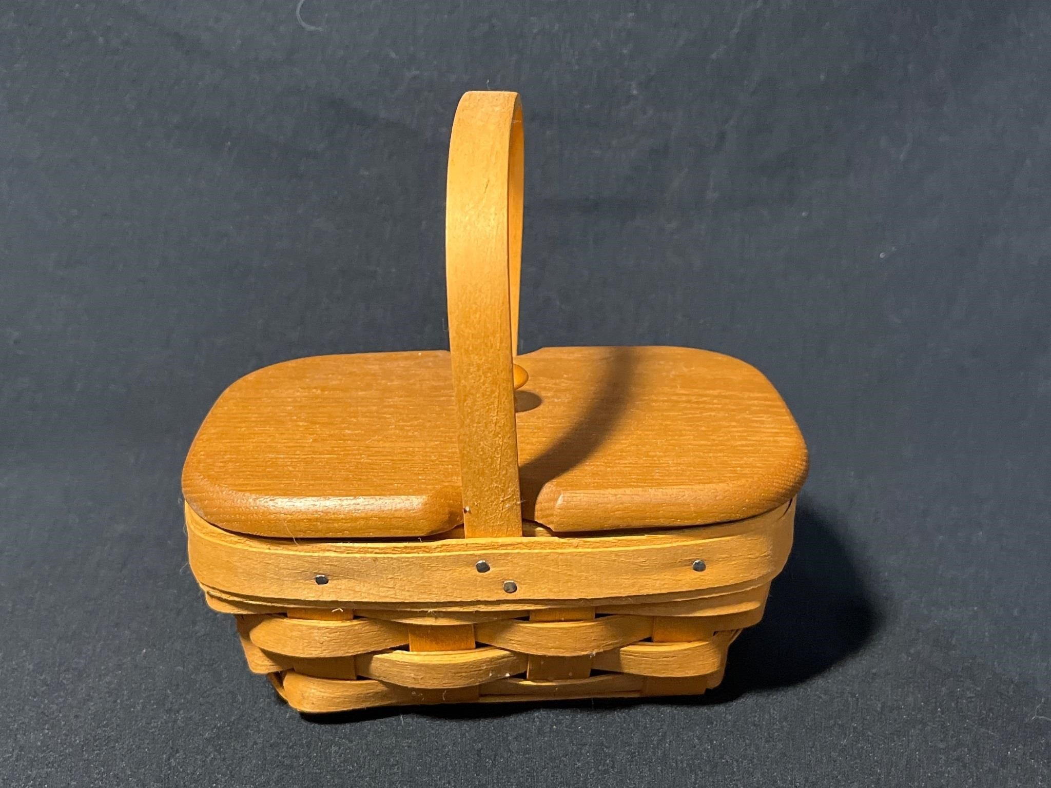 Mini Longaberger Baskets, with lid.