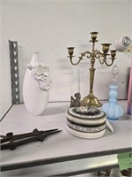 Shelf lot dolls, brass candle holder vases etc a