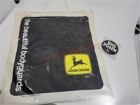 1975 snowmobile clothing bag & big john sticker