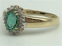 14k ladies ring with Emerald and Diamonds