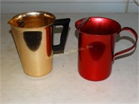 2 Metal pitchers