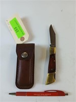 Camillus 3-in lock blade with leather sheath