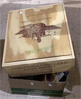 Box contains a wooden wine box, two Xbox games, a