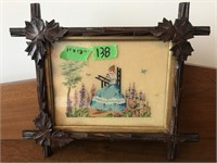 Antique wood carved frame with needle point