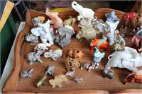 entire collection of elephants on wooden tray