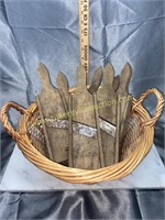 Basket of primitive cheese graters